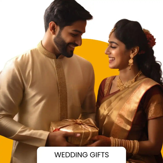 A couple exchanging a wedding gift, with the man holding a wrapped present.